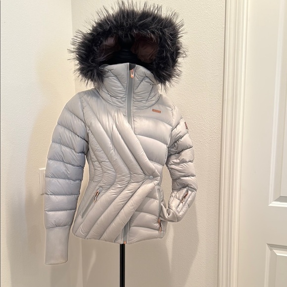 Stylish Silver Puffer with Chevron Design and Faux Fur Hood - Picture 1 of 13